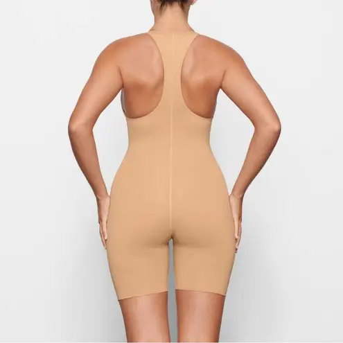 SKIMS NWT Swim Cycle Suit One Piece Women's Size M Ochre Racerback Scoop Neck L