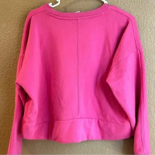 All In Motion  Lot-two cropped sweatshirts in size xs in both teal and hot pink