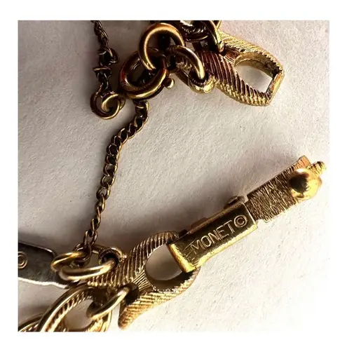 Monet Vintage  gold tone violin class of '67 charm bracelet