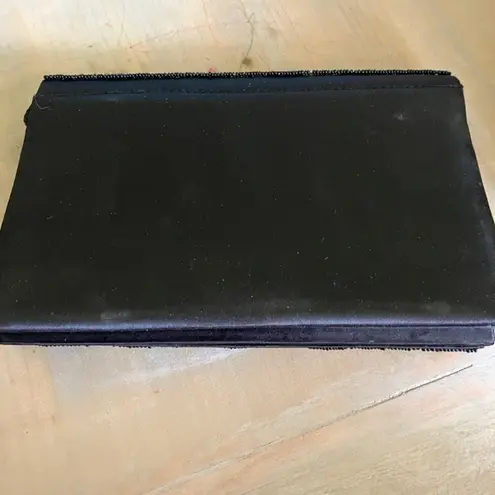 Edgy Black and Gold Skull Clutch