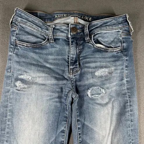 American Eagle Jeggings Size 2 Regular Wash Distressed Super Stretch Denim Jeans Blue