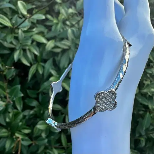 Silver tone clover bangle bracelet