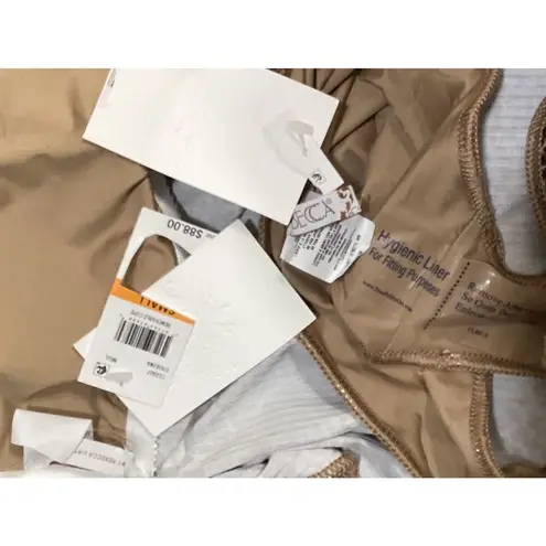 Becca New. Animal print Ribbed Tankini Set. Normally $155 S-top/M-bottom