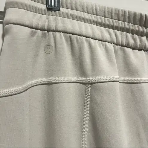 Lululemon  Softstreme High Rise Pant Full Length
Bone Size 14 Wide Leg Neutral