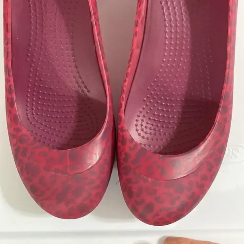 Crocs  Deep pink and purple Carlisa Animal Mini Wedge shoes size 10