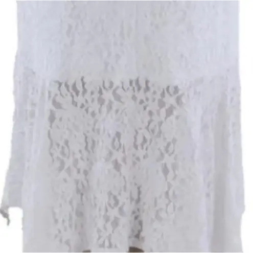 Kensie  White shark bite hem, floral lace dress . Lined. Size 10. NWT.