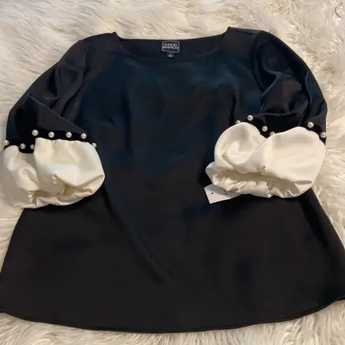 Coco Bianco  Blouse size S length 24” bust 34” color black and white (P6)