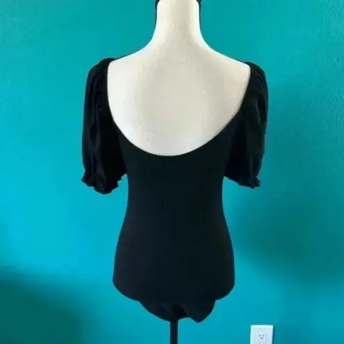 Pink Lily  black puff sleeve bodysuit in size small