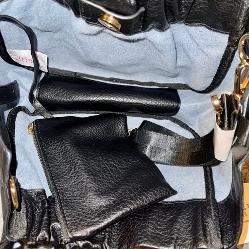 Trina Turk  Bucket Crossbody Tote Bag Black Drawstring Closure New With Tags