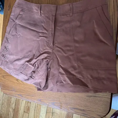 White House | Black Market  brown shorts with cross stick on side