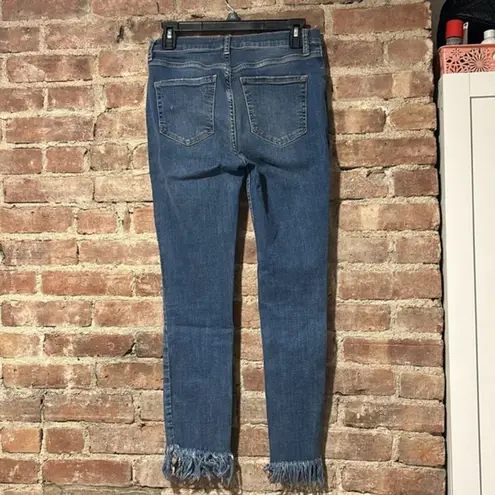 Free People  Great Heights Frayed Worn Indigo Low Rise Skinny Jeans Size 28