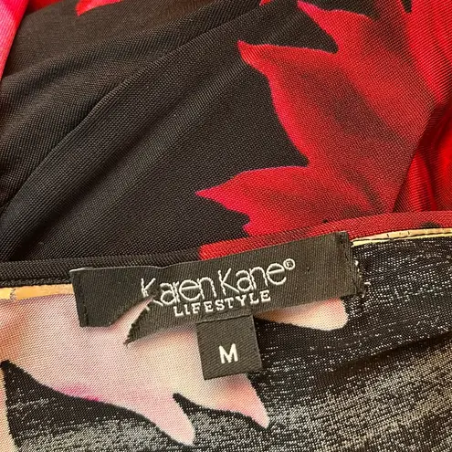 Karen Kane faux wrap elbow sleeve black pink red bold floral fit and flare dress