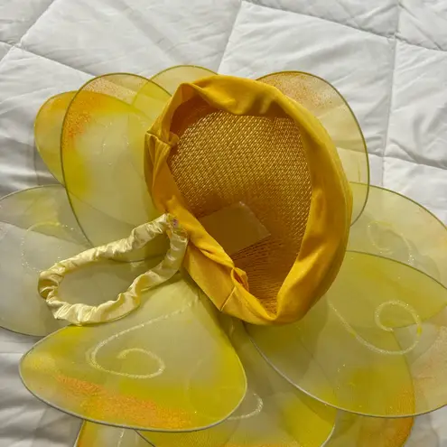 Handmade yellow floral hat. This hat was made for the stage in the theater.
