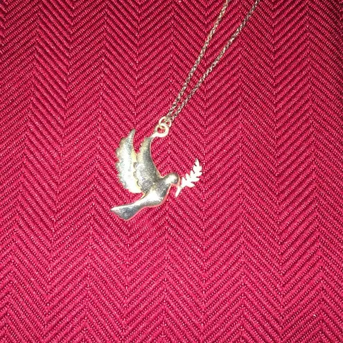 Bird gold colored charm