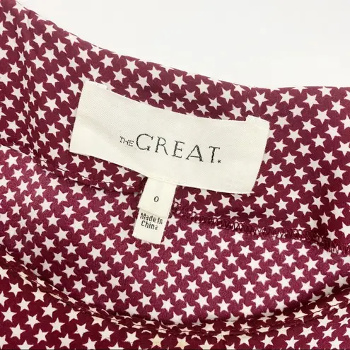 The Great . Star Print Silk Long Sleeved Top: Deep Burgundy