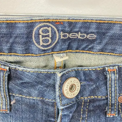 Bebe  EWomens Dark Wash Blue Denim Bootcut Low Rise Pants size 28 FLAWED