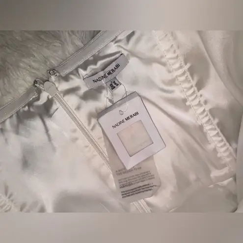 NWOT NADINE MERABI Vanessa Strapless Belted Crepe Flare White Jumpsuit sz 10