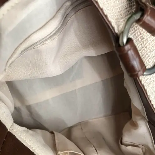 Cute 90s beige cream tan khaki crochet bag with a brown green pink stripes shoulder hand bag purse and buckle detail.