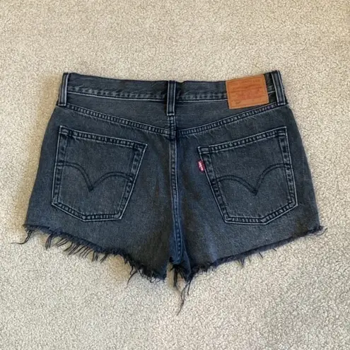 Levi's Levi’s 501 black ripped high rise jean shorts in size 28