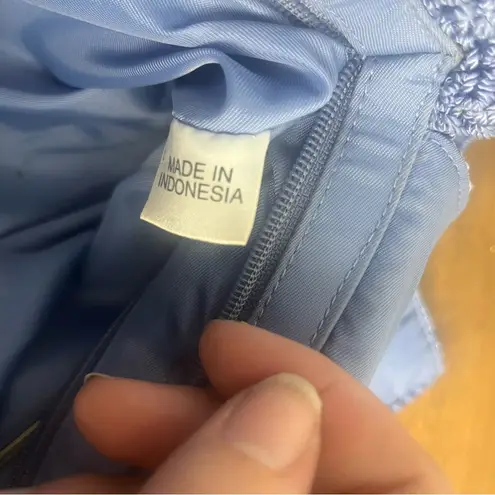 The Sak Y2K blue crochet shoulder bag with zipper closure