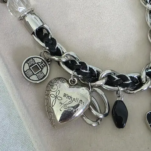 Silver and Black Charm Necklace Mixed Media