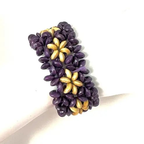 Purple and tan woven beaded bracelet