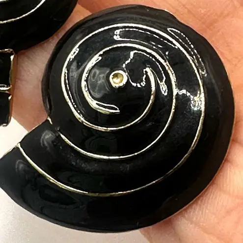 black and gold tone snail enamel earrings