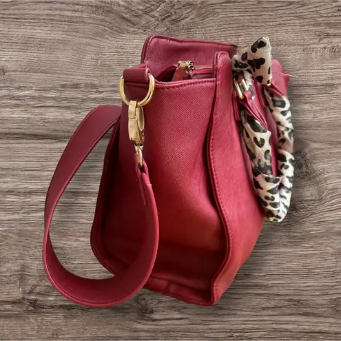 BCBG Paris Satchel Handbag with scarf wrapped strap handles. Red