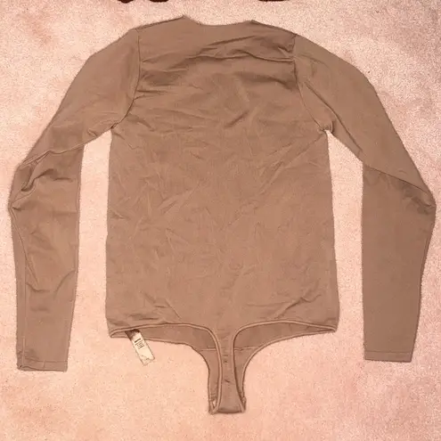 SKIMS  Essential Crew Neck Longsleeve Thong Bodysuit