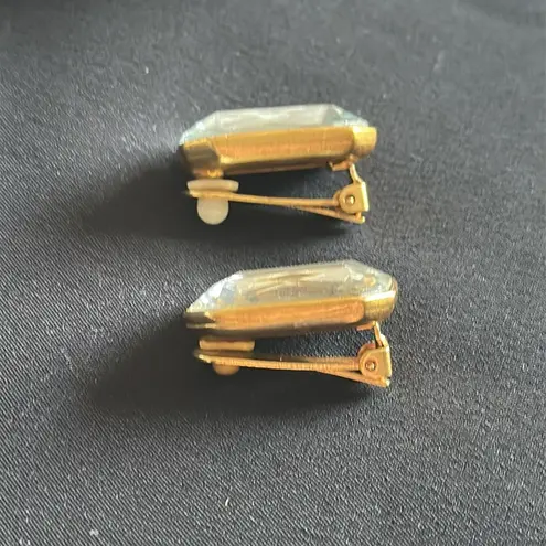 Vintage EUC light blue glass radiant cut clip earrings in goldtone setting