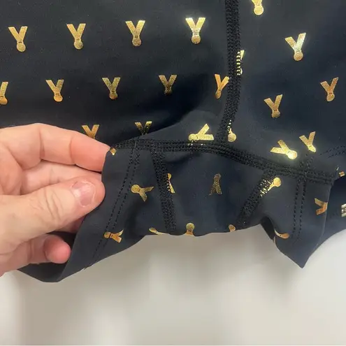 Oiselle Gold Mettle short shorts, with metallic medal pattern size medium