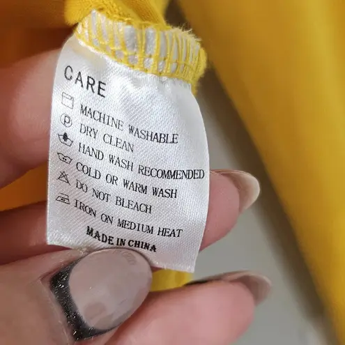 long sleeve yellow mango pop bodysuit Size L