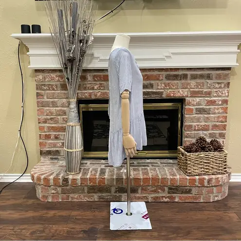 CARAMELA light blue and white pinstriped peplum blouse w/keyhole back / L / EUC