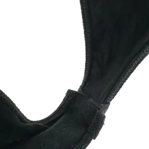 Lush Clothing Lush size XL black short sleeve body suit snap close crotch crossover‎ back