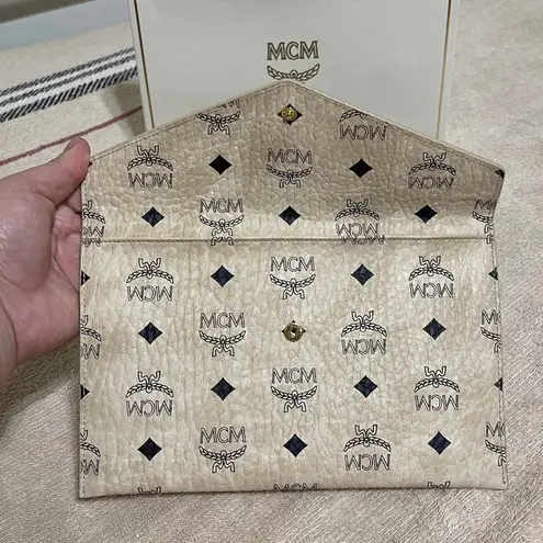 MCM Novelty Item Cream and Black Logo Clutch