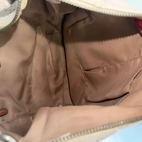 The Sak  Perforated Leather Hobo Shoulder Bag Cream Tassel Zip Pockets