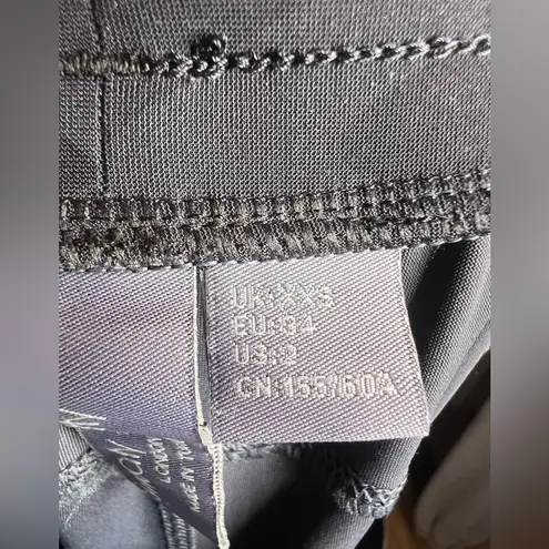 Sweaty Betty [Small Explorer Trouser in Black Tonal Camo. Size 2