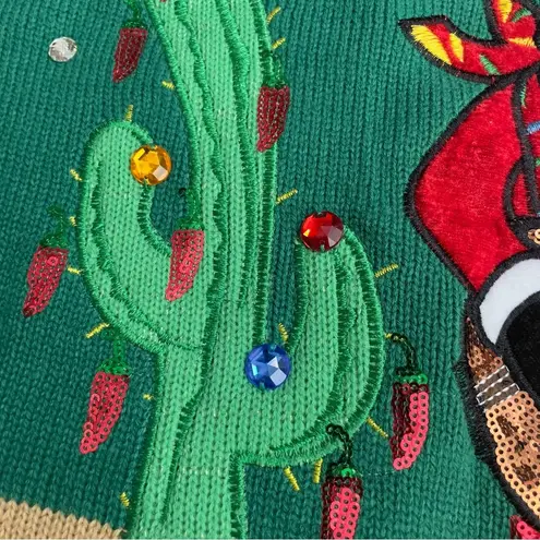 Holiday Time Feliz Navidad
Santa Sombrero Guitar Boots
Green Christmas Sweater