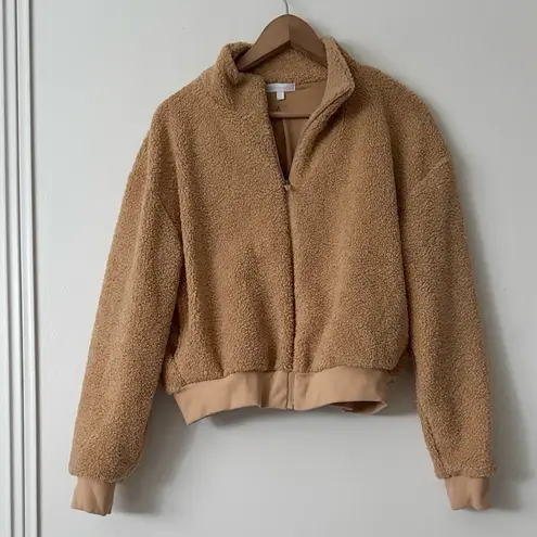 Beyond Yoga S Brave The Elements Sherpa Bomber in Tan