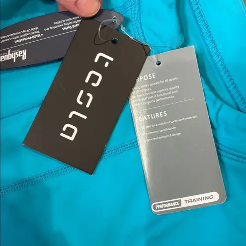 Tesla Gears Women’s Rashguard Top UV Protection Side Ruche Turquoise NWT Size XS