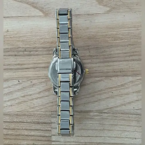 Caravelle by Bulova Ladies Watch Diamonds Black Dial Two Tone Bracelet