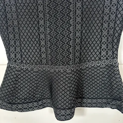 BCBGMAXAZRIA  Jaylenne Black Sweater Knit Peplum Top, EUC, Medium, MSRP $128