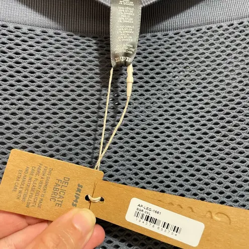 SKIMS Perforated Open Knit Seamless Leggings in Steel Gray