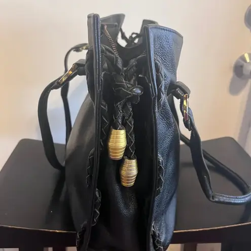 A.P.C.Elegant Black Leather Tote Bag With Brass Accents.