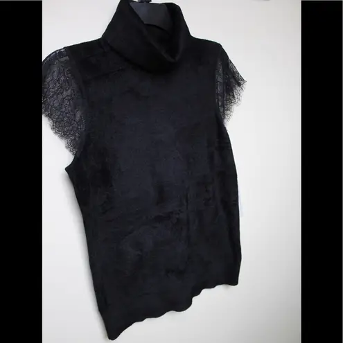 Carlisle | turtle neck blouse with lace sleeves