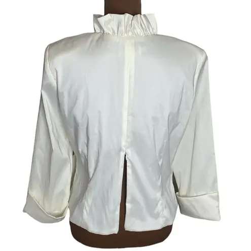 XScape ivory ruffled special occasion top with rhinestone button buckle size 12