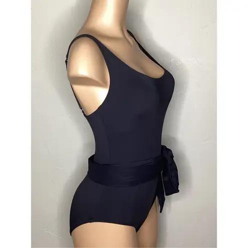 Coco reef New. black skirted one piece. Size 16 Retails $152