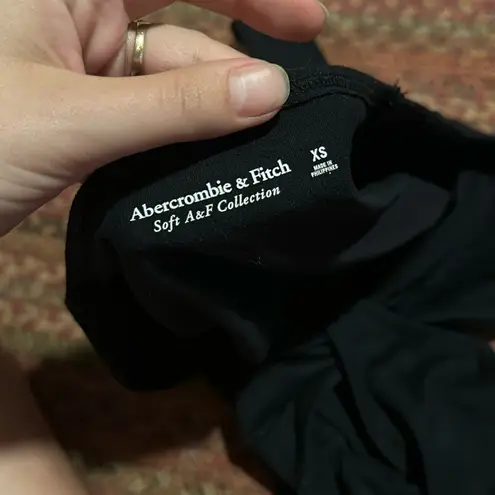 Abercrombie & Fitch  BLACK SOFT AF LONG SLEEVE CUT OUT BODYSUIT THONG FIT