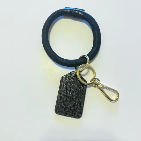 Boulevard Keychain wristlet, black and gold tone carabin closure