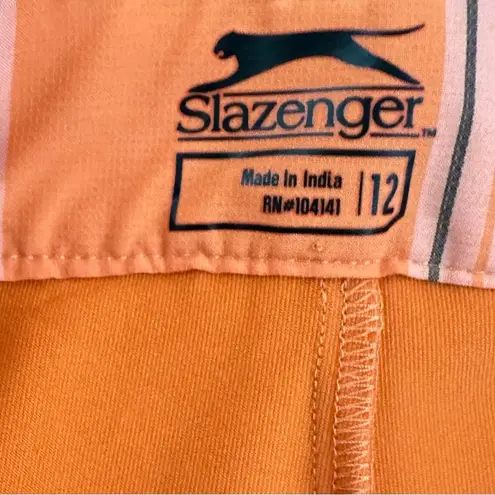 Slazenger  size 12 golf skort orange navy white plaid